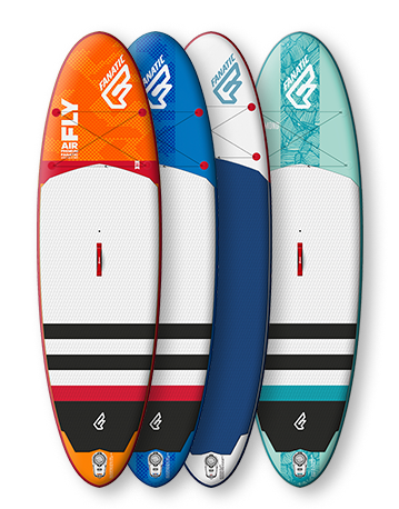 Four inflatable stand up paddleboards stood upright in orange, blue, navy and mint