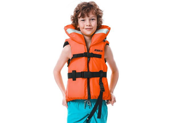 Smiling boy wearing an orange foam life jacket with black webbing straps against a white background